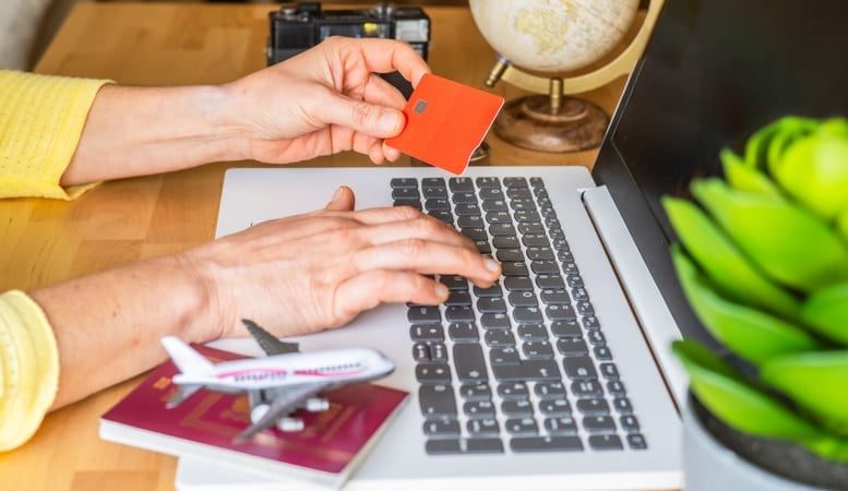 booking flight with orange credit card