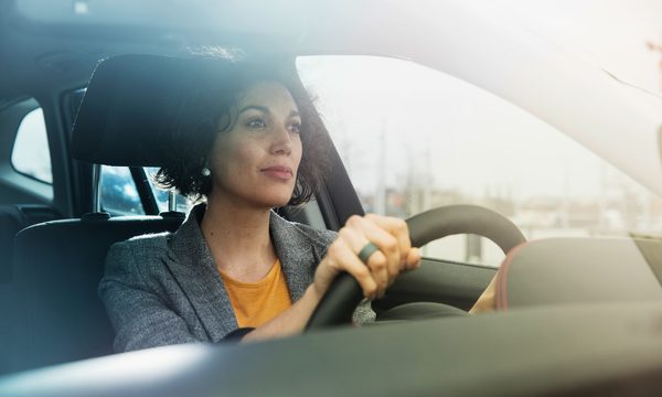 Woman driving her car