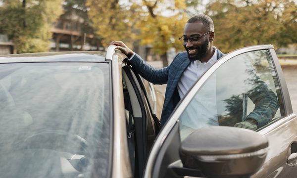 Man getting into his car
