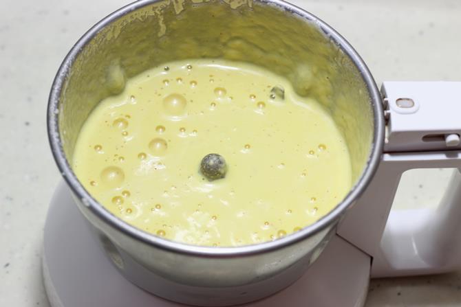 addition of milk to blend the ingredients for badam kheer
