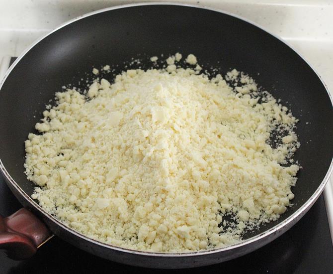 Grated khoya in a pan