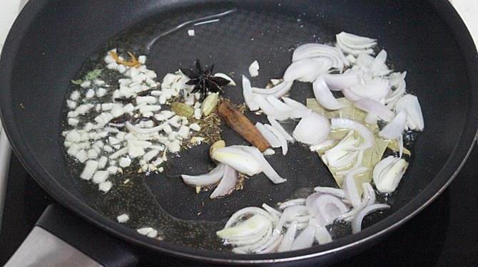 frying ginger garlic to make potato rice