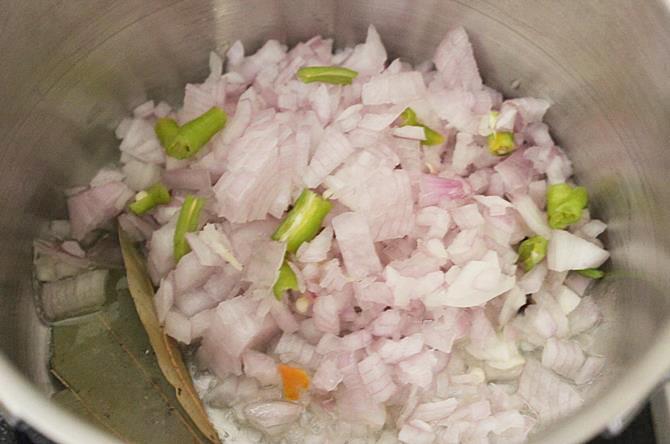 frying onions to make soya chunks curry
