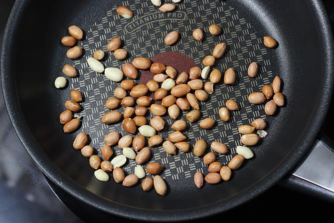 frying peanuts for stuffed brinjal fry