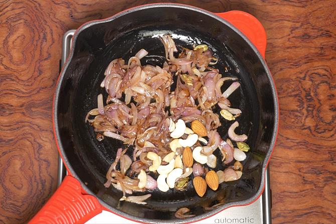 fry nuts to make korma curry