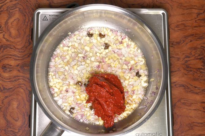 adding red chili paste