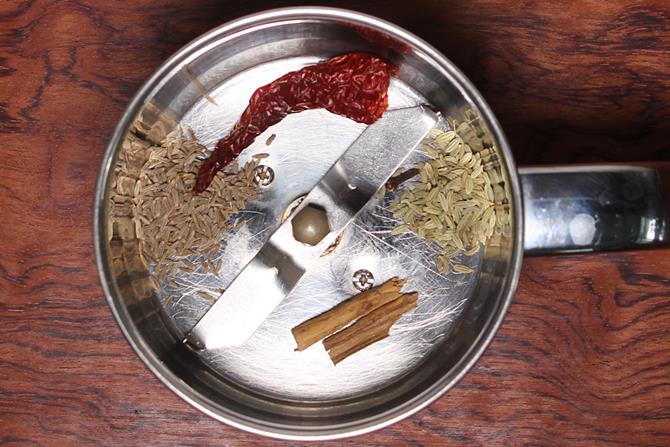 Add red chilies, jeera, cinnamon stick