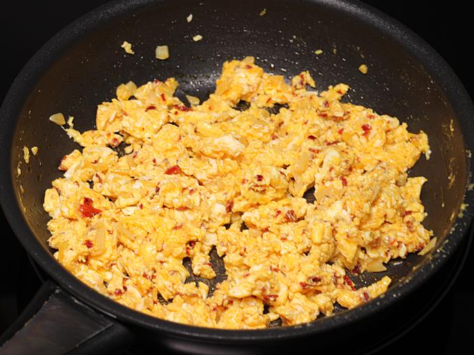 Scramble eggs to make pasta