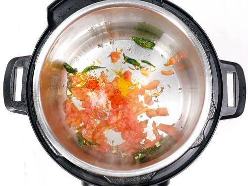 adding tomatoes spice powders for instant pot dal rice