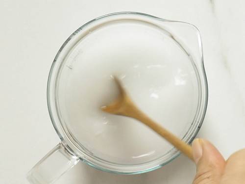 mixing cornstarch or arrowroot powder with water