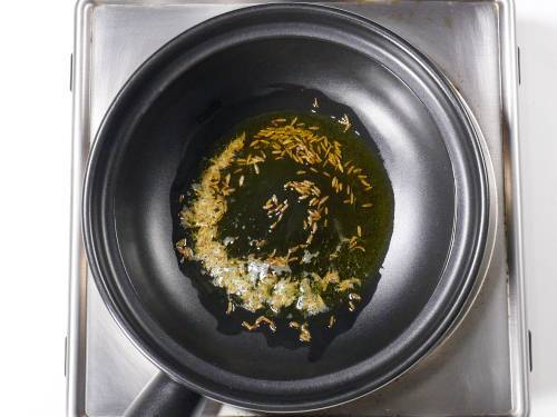 cumin seeds in hot oil