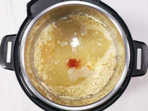 adding water and saffron