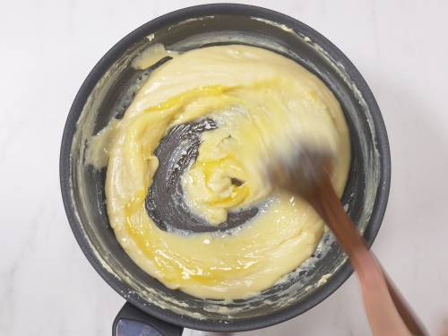 add ghee to khoya mixture
