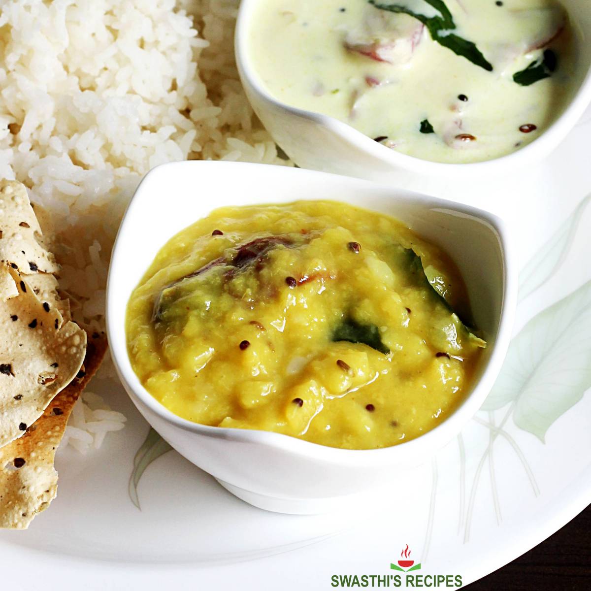 Mamidikaya pappu recipe made with mango lentils and spices.