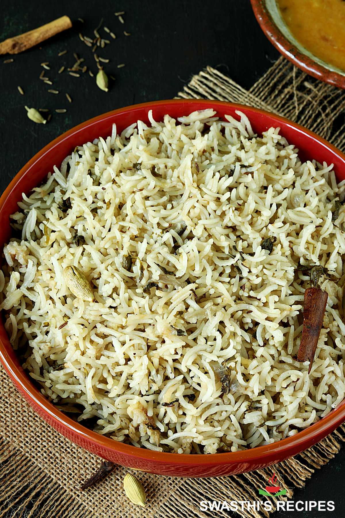 Bagara Rice (Chawal) in a red bowl