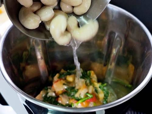 adding ingredients to a blender