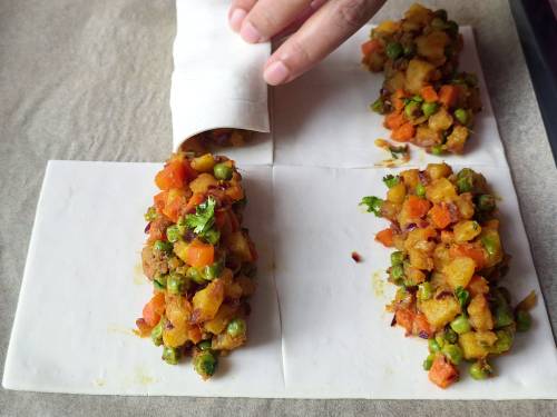 filling the puff pastry sheets