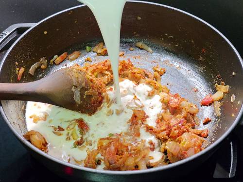 adding coconut milk and water to make kerala egg curry